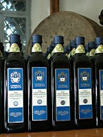 Alcune delle confezioni in vetro dell'Olio Extravergine d'Oliva IGP Toscano del Castello di Grotti - Siena